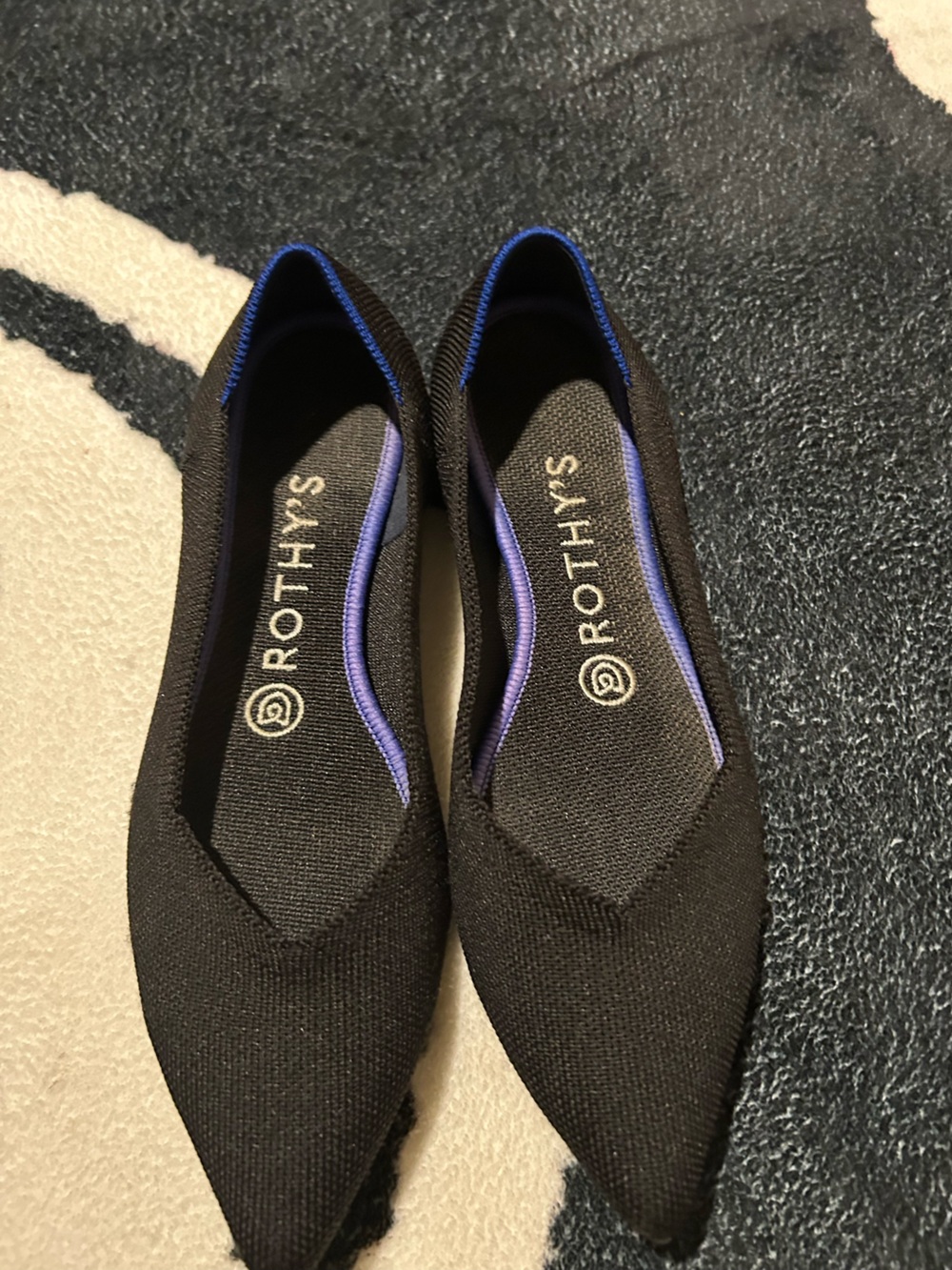 Rothy's Women's Black Pointed Flats with Purple Trim Accents